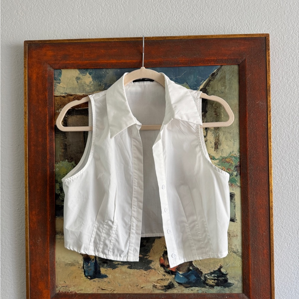 White Sleeveless Button-Up Vest